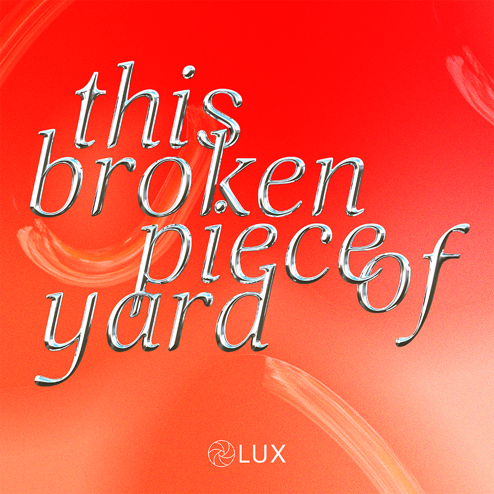 The title graphics with a liquid metal texture reads “this broken piece of yard”. The background is a gradient of red and orange with two subtle rough brush strokes.
