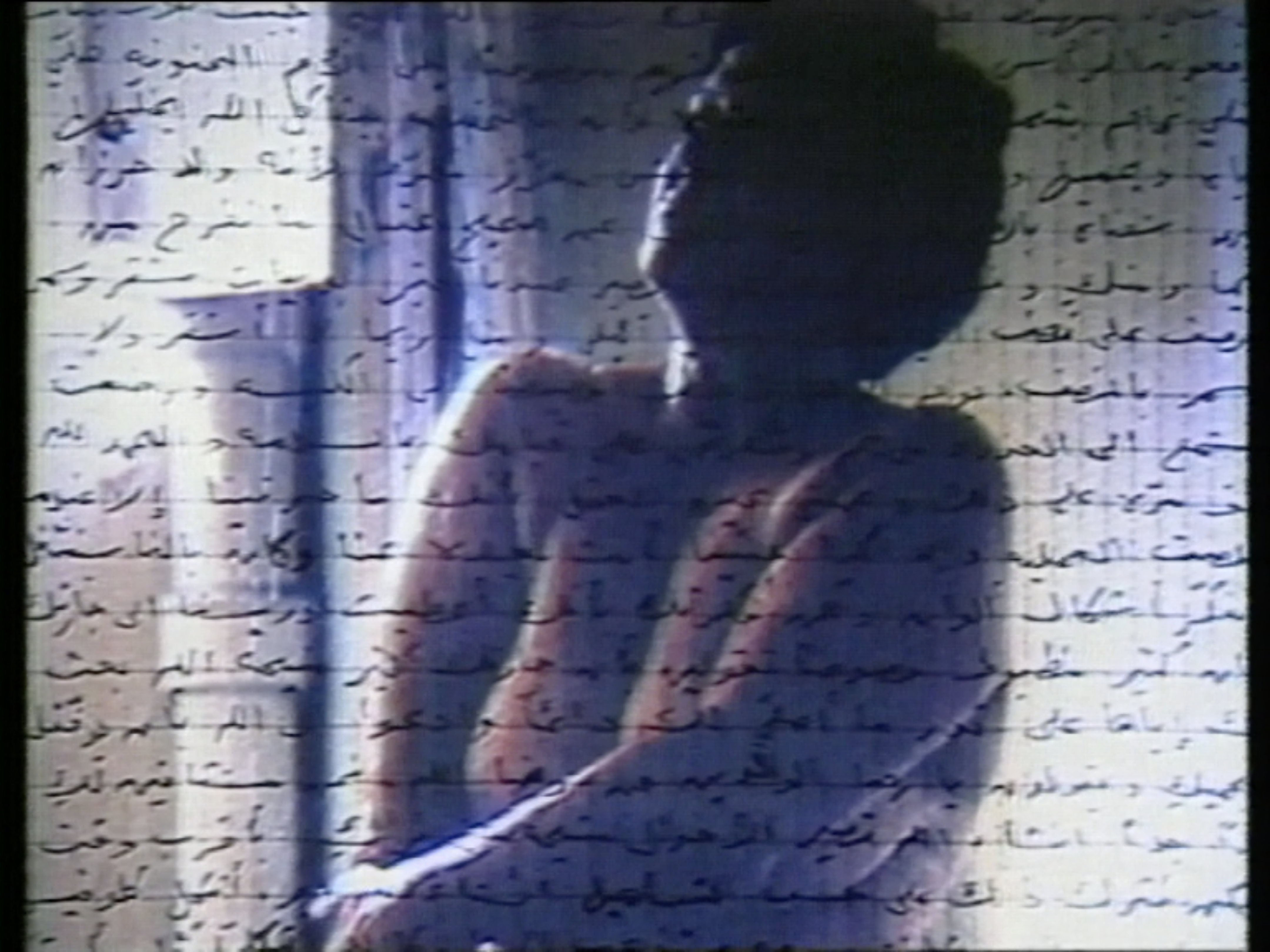 A still from measures of distance by mona hatoum. A torso of a naked woman is overlaid by a handwritten letter in arabic. 