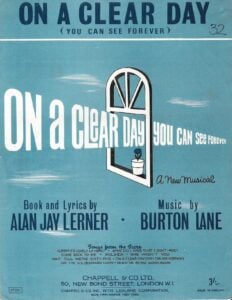 a cover of a sheet music publication of On a Clear Day you can see forever by Alan Jay Lerner and Burton Lane. It is blue and the title recedes into the distance through a drawing of a window