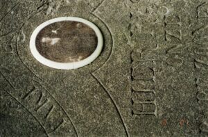 close up detail of a grave stone