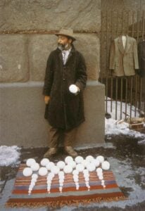 image of artist David Hammons, selling snowballs outside of Cooper Union, 1983