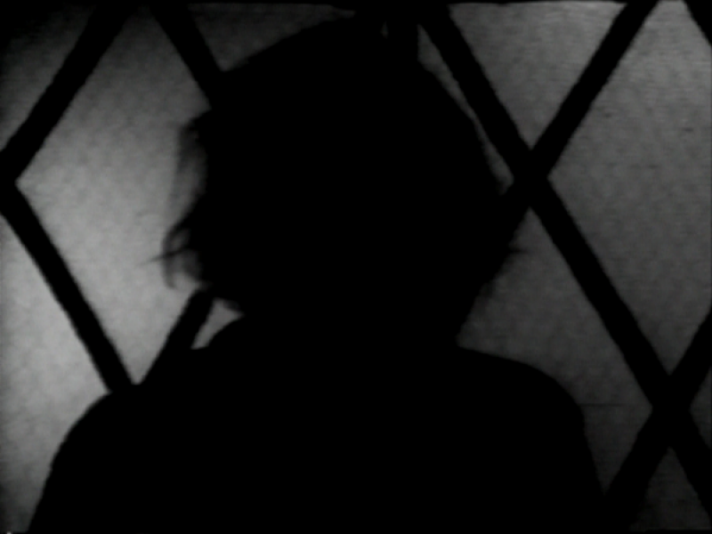 Image Credit: a still from The Red Tapes by Vito Acconci