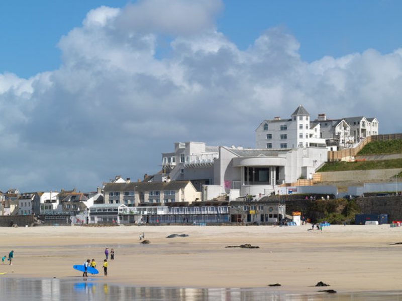 An image showing the beach at St Ives, with Tate St Ives in the background. Courtesy of Tate.